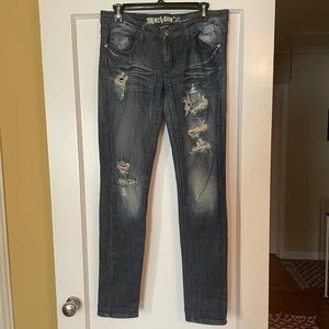 Distressed dark wash jeans